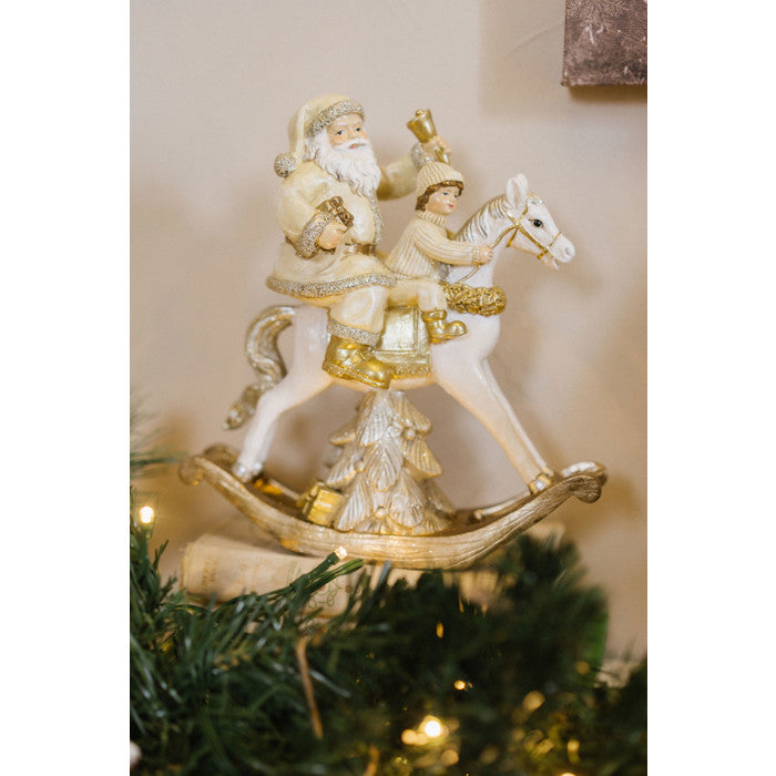 NUVOLE DI STOFFA Babbo Natale su Cavallo a Dondolo in Resina Oro