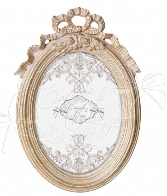 COCCOLE DI CASA Portafoto Ovale "Bow" Dorato Sbiancato con Fiocco
