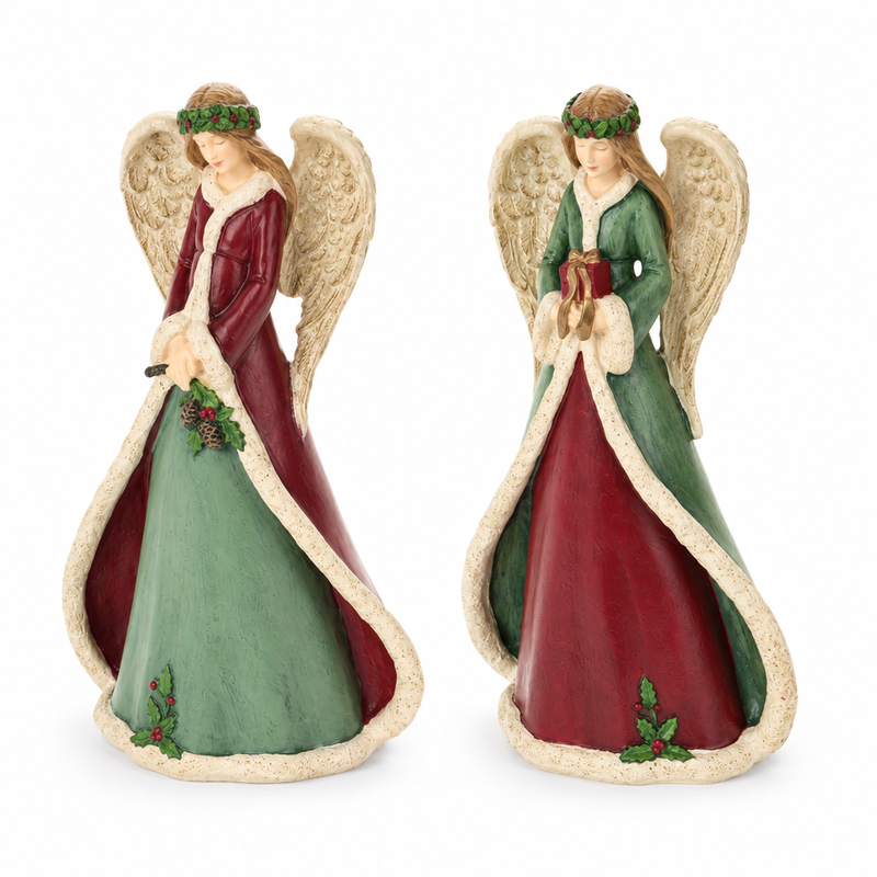 Due angeli natalizi con agrifoglio e pacchetto regalo
